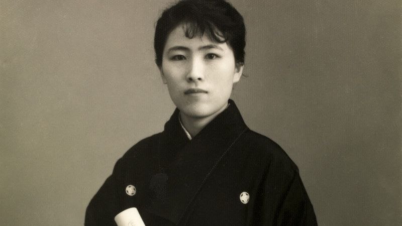 Woman in a formal crested kimono
