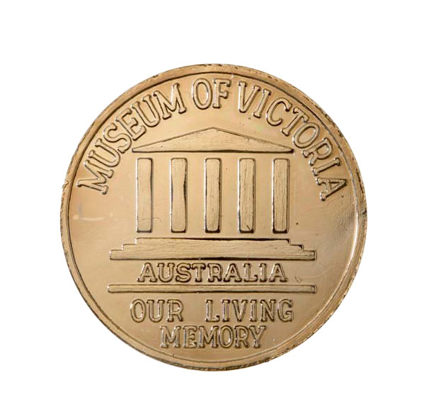 A commemorative coin with the text 'Museum of Victoria, Australia - Our living memory'