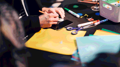 Adults at Nocturnal enjoying a crafting activity.