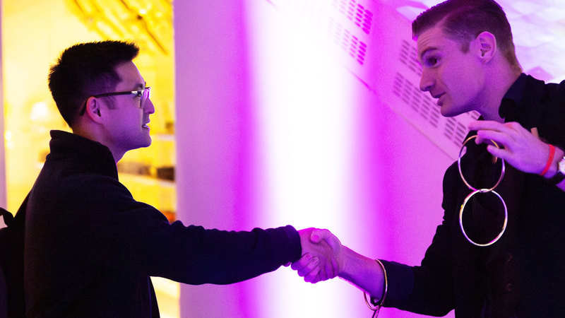 A magician performs at Scienceworks After Dark.
