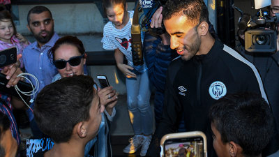 Hakeem al-Araibi greats young players and the press.