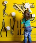 A child using a wrench