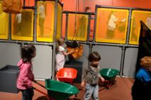 Children loading bricks