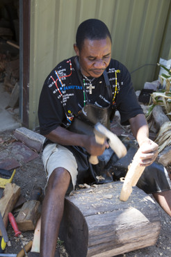 Artist Nickel Ngadwa Mundabi creating carving at the Shepparton workshop.