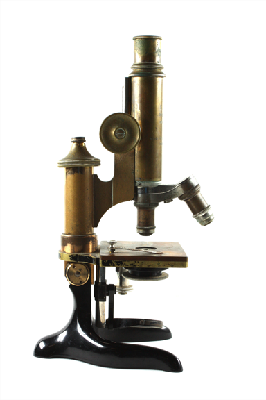 Old microscope made in 1910.