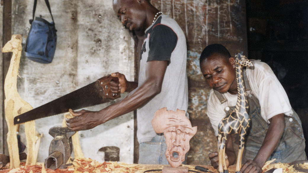 Two men doing woodwork