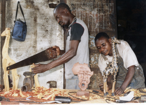 Two men doing woodwork