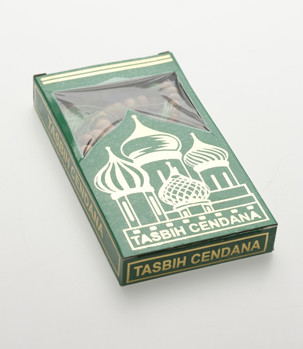 Green box with beads inside