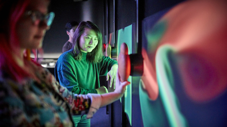 Visitors interact with Scienceworks exhibition "Beyond Perception: Seeing the Unseen".