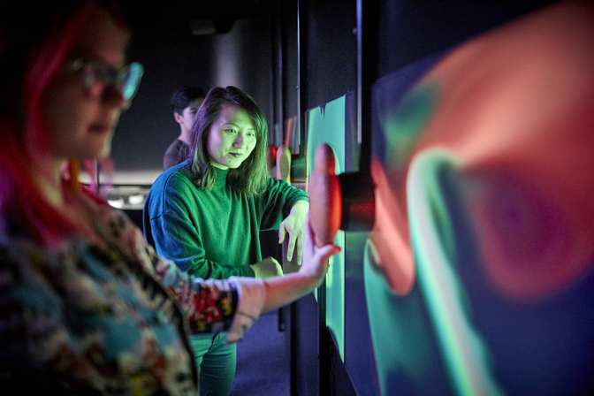 Visitors interact with Scienceworks exhibition "Beyond Perception: Seeing the Unseen".