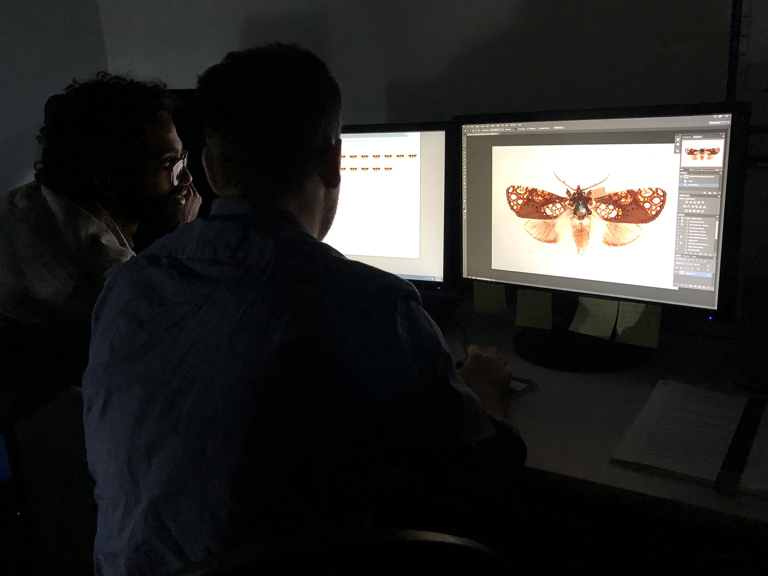 Nish Nizar zooming in on specimen.