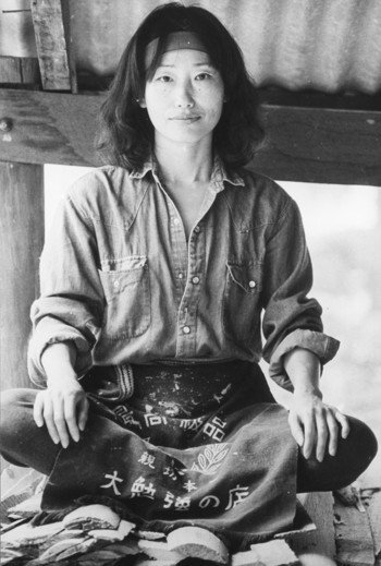 Woman sitting cross legged