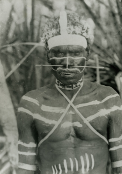 Aboriginal man wearing a beaded neckband