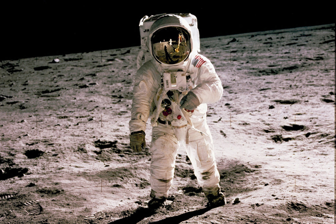 Buzz Aldrin standing in the Sea of Tranquility, on the lunar surface. 