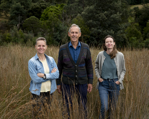 Bob Brown with co-directors Laurence Billiet and Rachael Antony standing in native Australian glassland.