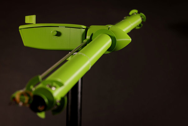 Close-up view of a bright green turbine system.