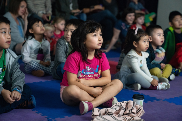 A story being read to children.