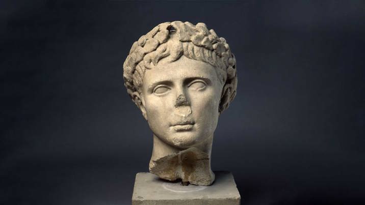 Carved stone head of Emperor Augustus.