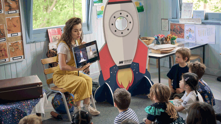Kindergarten children learning about how astronauts journey to space using rockets during Museum Victoria's Rockets and Robots kindergarten incursion program