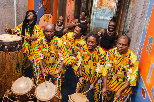 WALA Drum & Dance Ensemble posing with their drums.