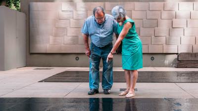  Visitors in Tribute Garden at Immigration Museum