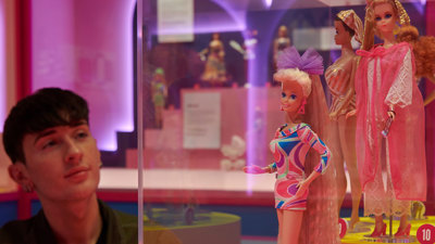 A display of barbies showcasing various designs of hair.