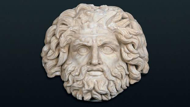 Stone mask of the roman god Jupiter.