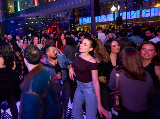 People dancing during Discoteca Italiana, Melbourne Museum.