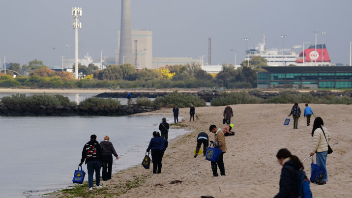 BeachPatrol Volunteers on a Local Beach Picking up Plastic Rubbish