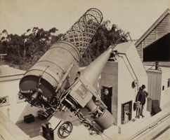 The Great Melbourne Telescope in 1869, pointing into the sky while a well-dressed operator stands in the foreground.