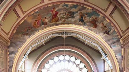 Paintings of Roman demi-gods representing ‘war’ in the Royal Exhibition Building, under the dome.