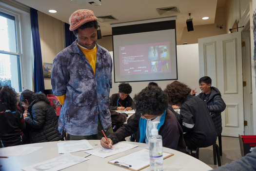 Culture Makers artist Olana Janfa running Culture Makers Lab with young people at the Immigration Museum