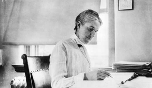 Henrietta Swan Levitt examining data during her long career at Harvard University Observatory.  