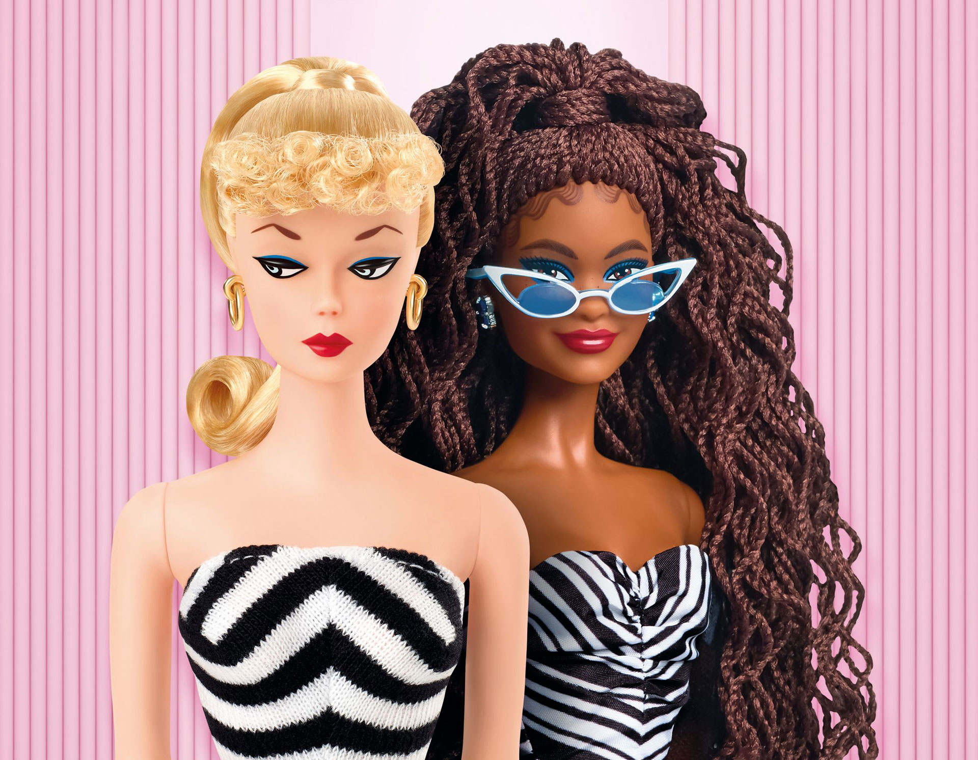 Two Barbie dolls