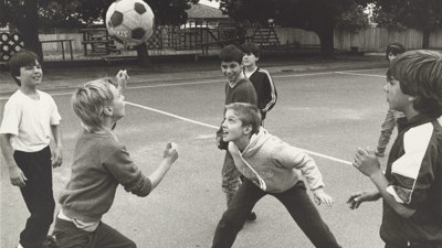 Lebanese, Italian, Greek and Anglo-Australian boys practice with a soccer ball.